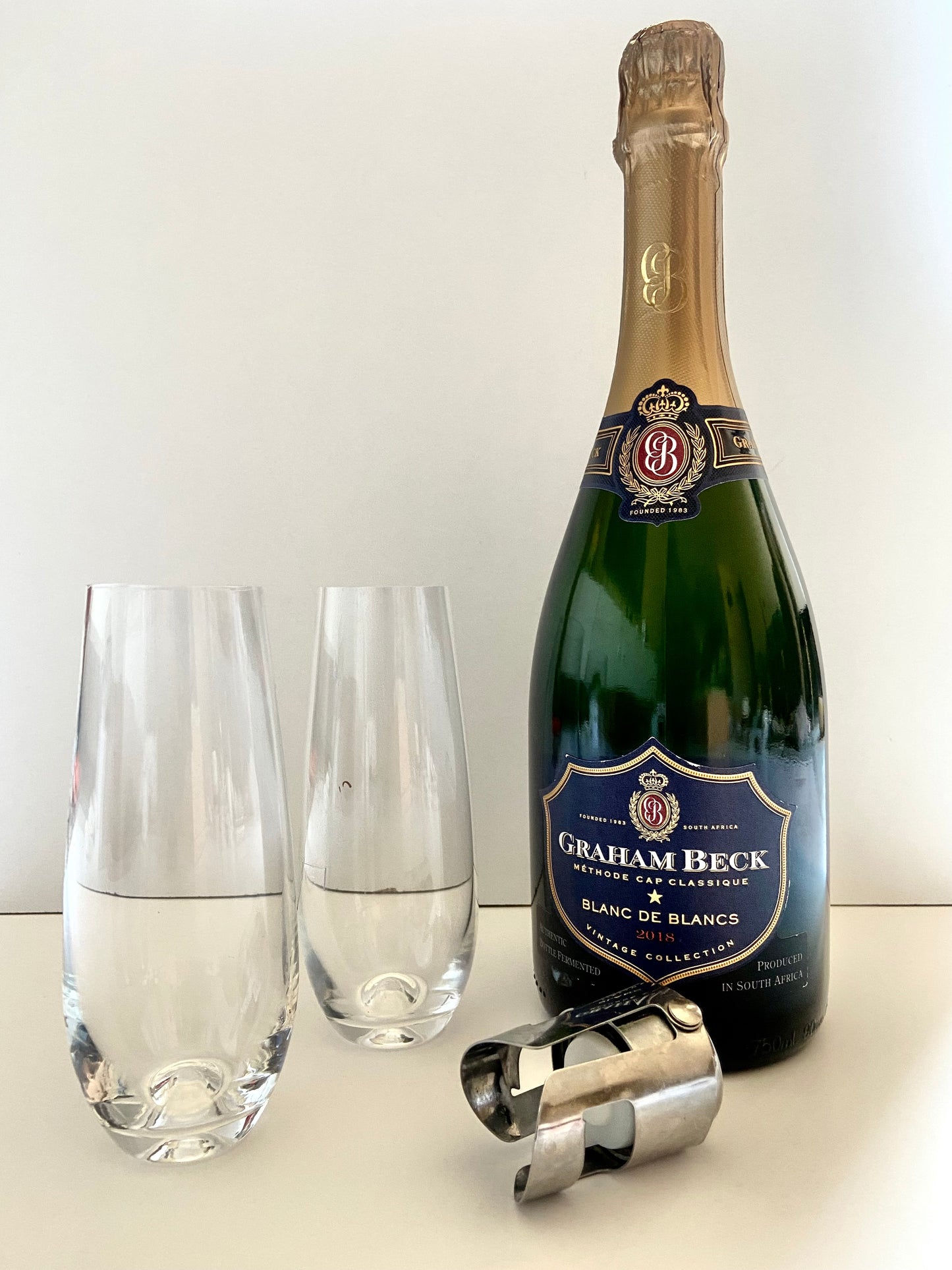 Graham Beck MCC Champagne in box, stemless flute glasses in box